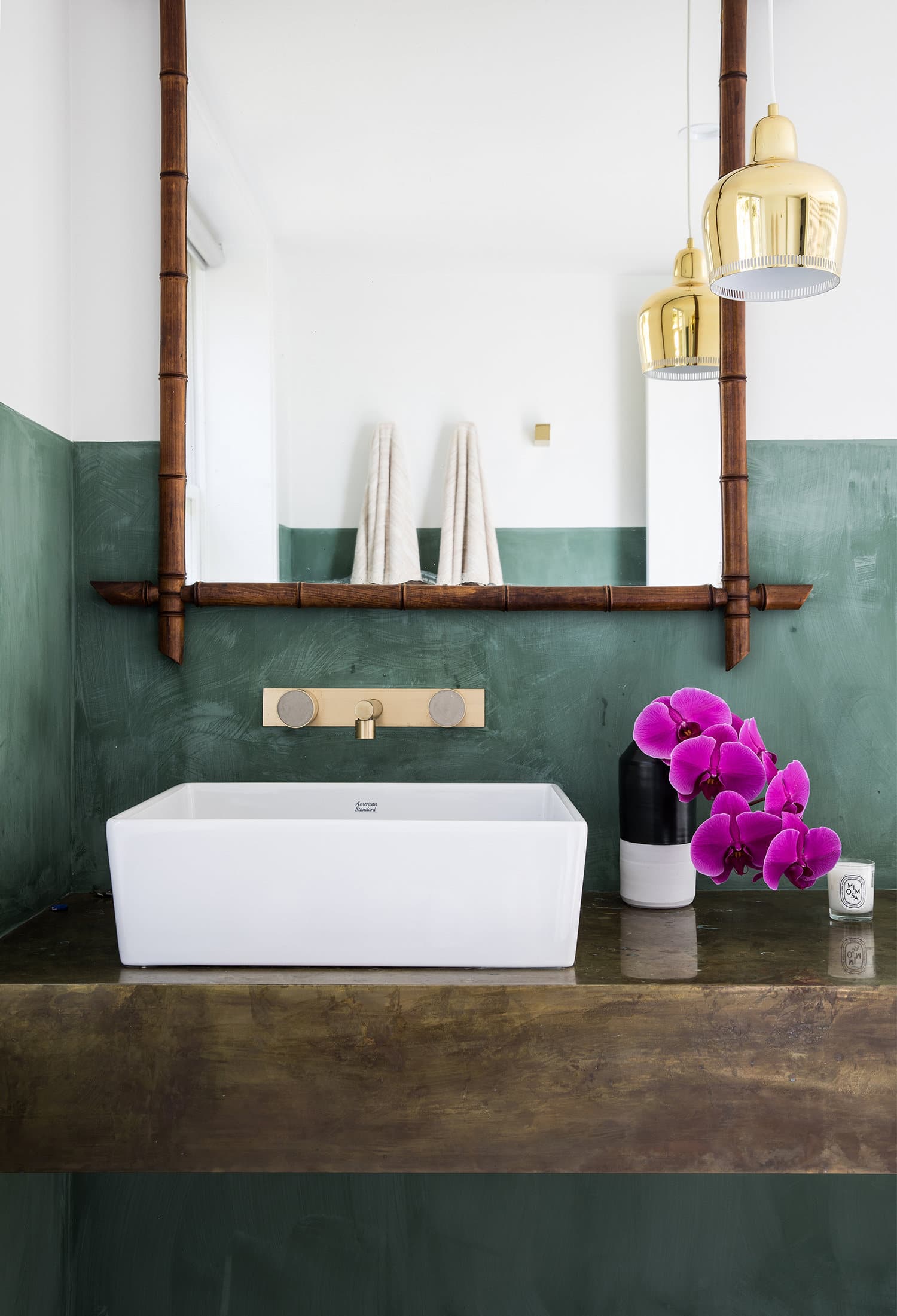 green half wall and a mix of modern and rustic in this bath | house tour on coco kelley