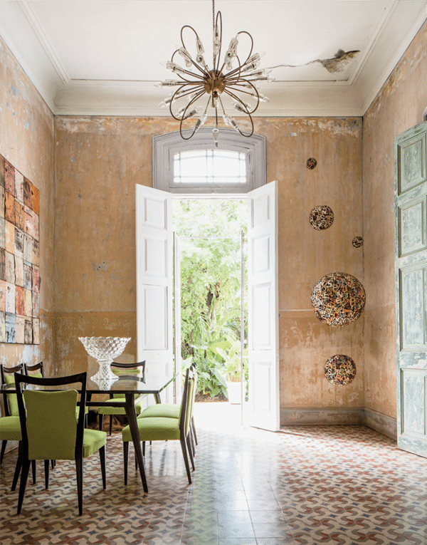 havana home dining room with art and a statement chandelier