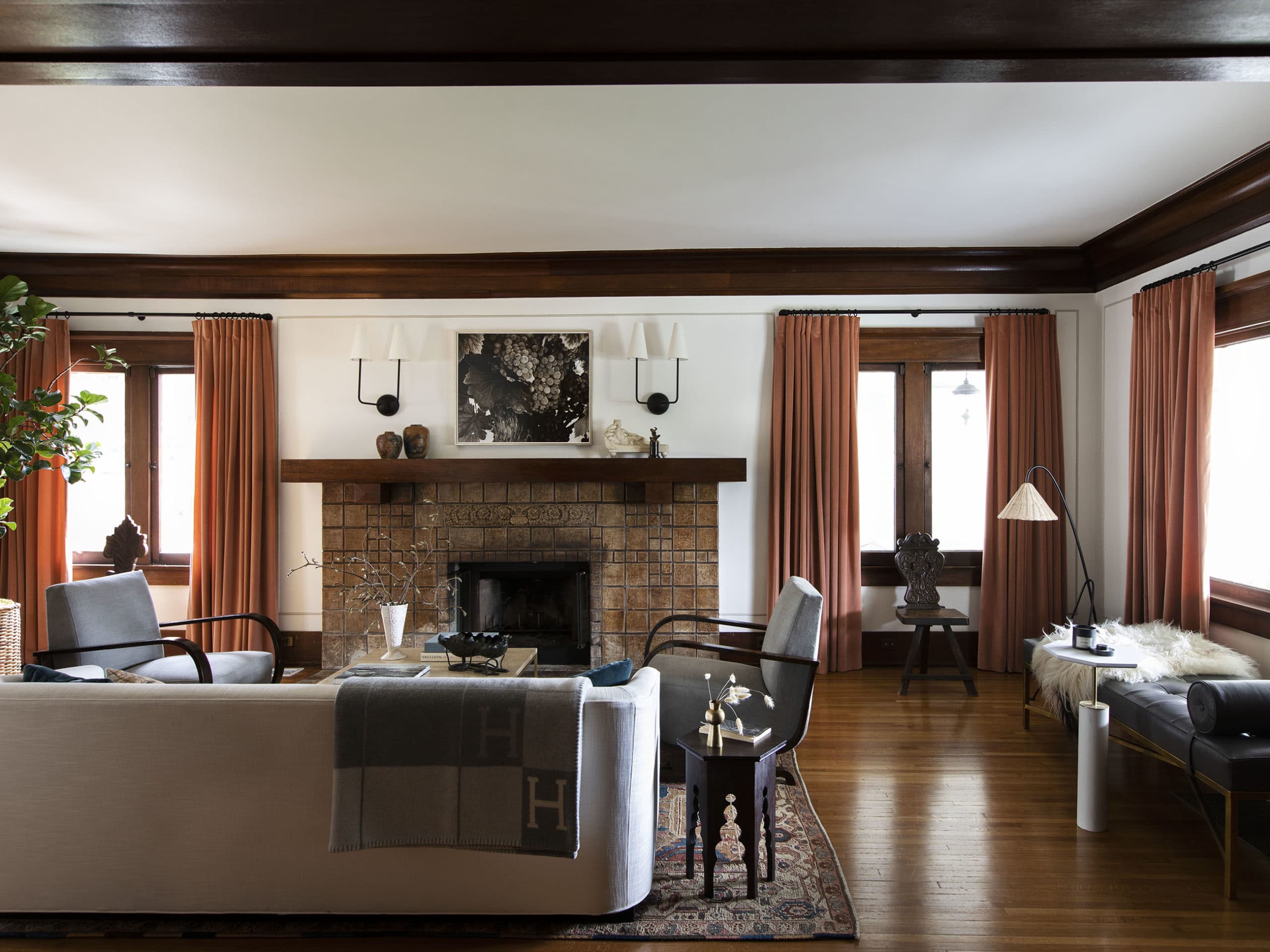 historic fireplace and terra cotta drapes | modern historic craftsman house tour jacey duprie