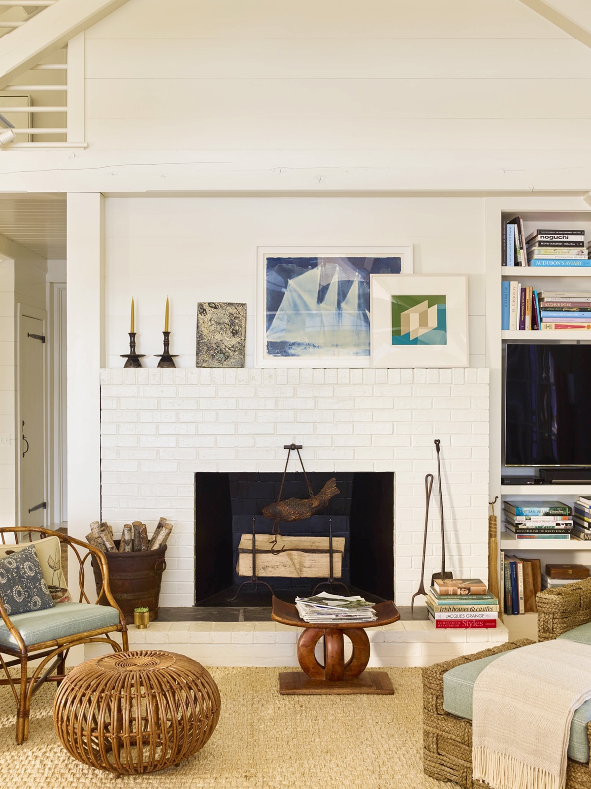 seaside main cottage living room fireplace with art | coco kelley