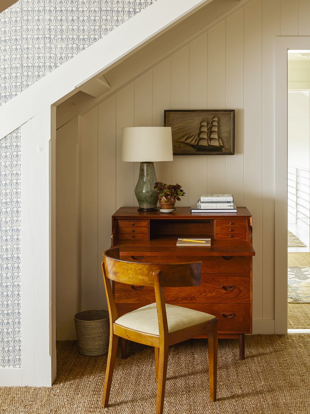 antique desk in an attic nook | seaside cottage house tour on coco kelley