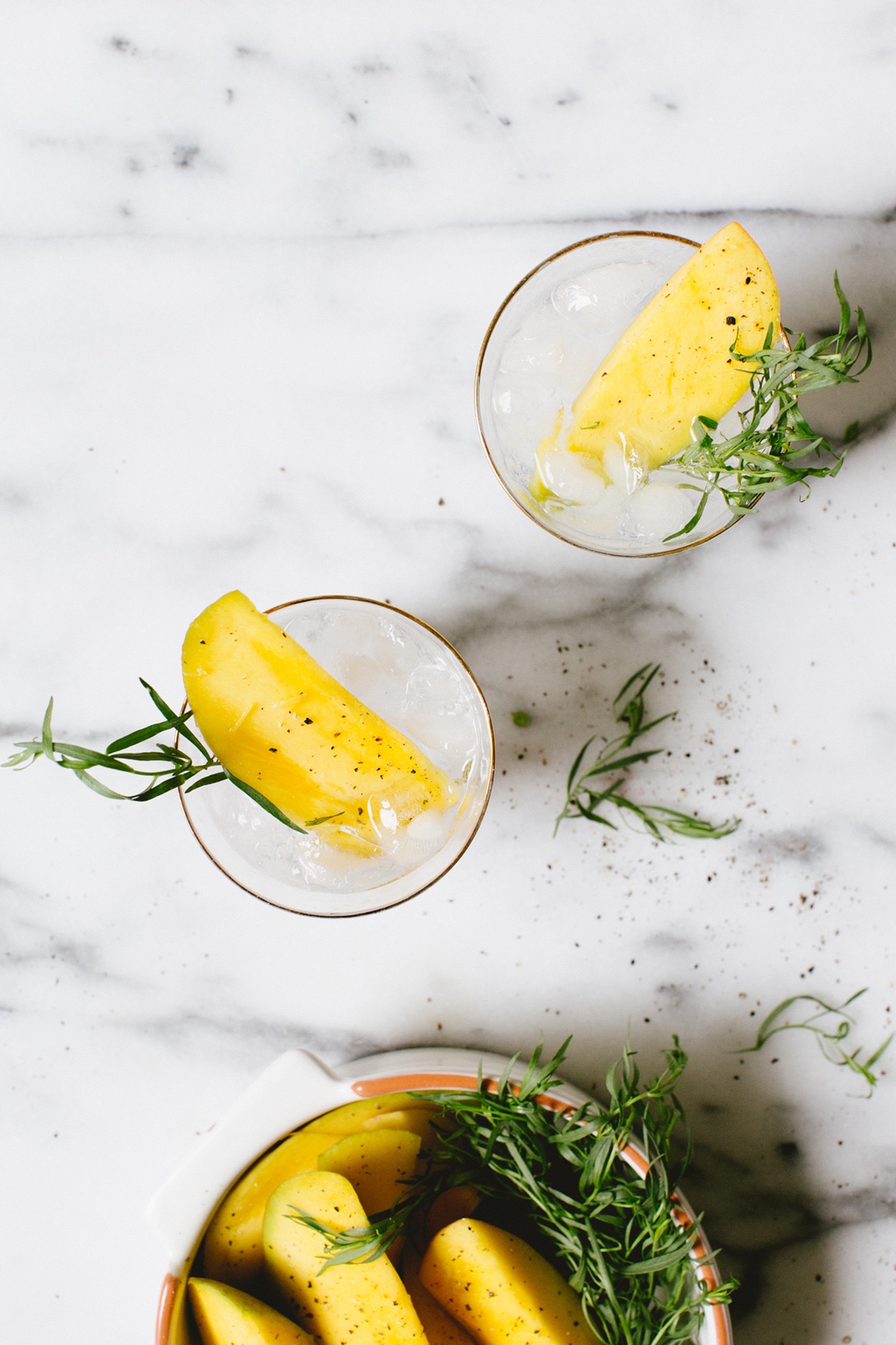 we've been doing this classic cocktail all wrong. find out why a mango gin & tonic (with pepper!) is the way to go! | recipe on coco kelley