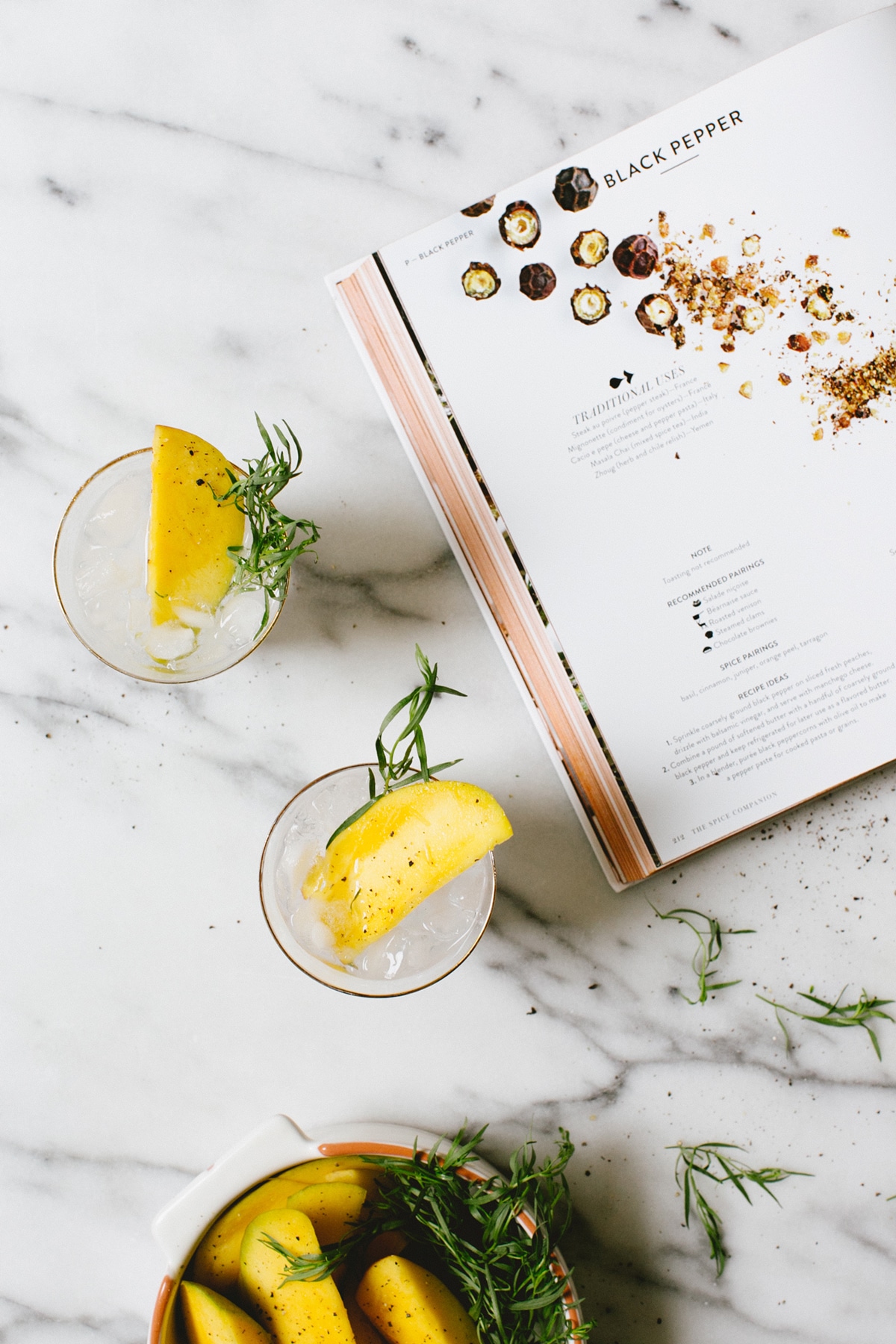 we've been doing this classic cocktail all wrong. find out why a mango gin & tonic (with pepper!) is the way to go! | recipe on coco kelley