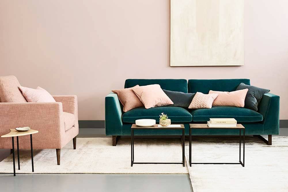 gorgeous green sofa with pink walls and accents | coco kelley