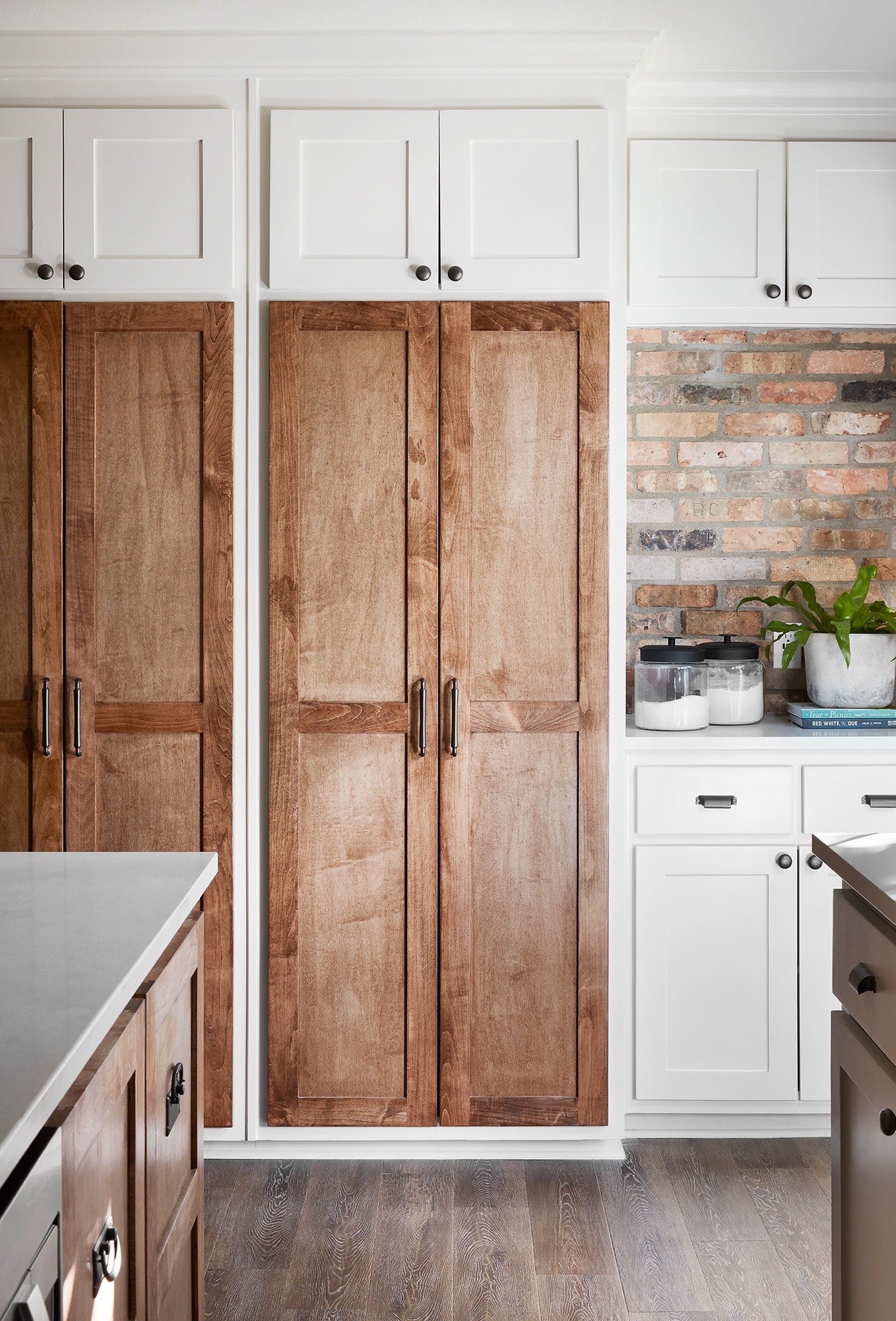keeping cabinet doors unfinished gives the look of old world charm