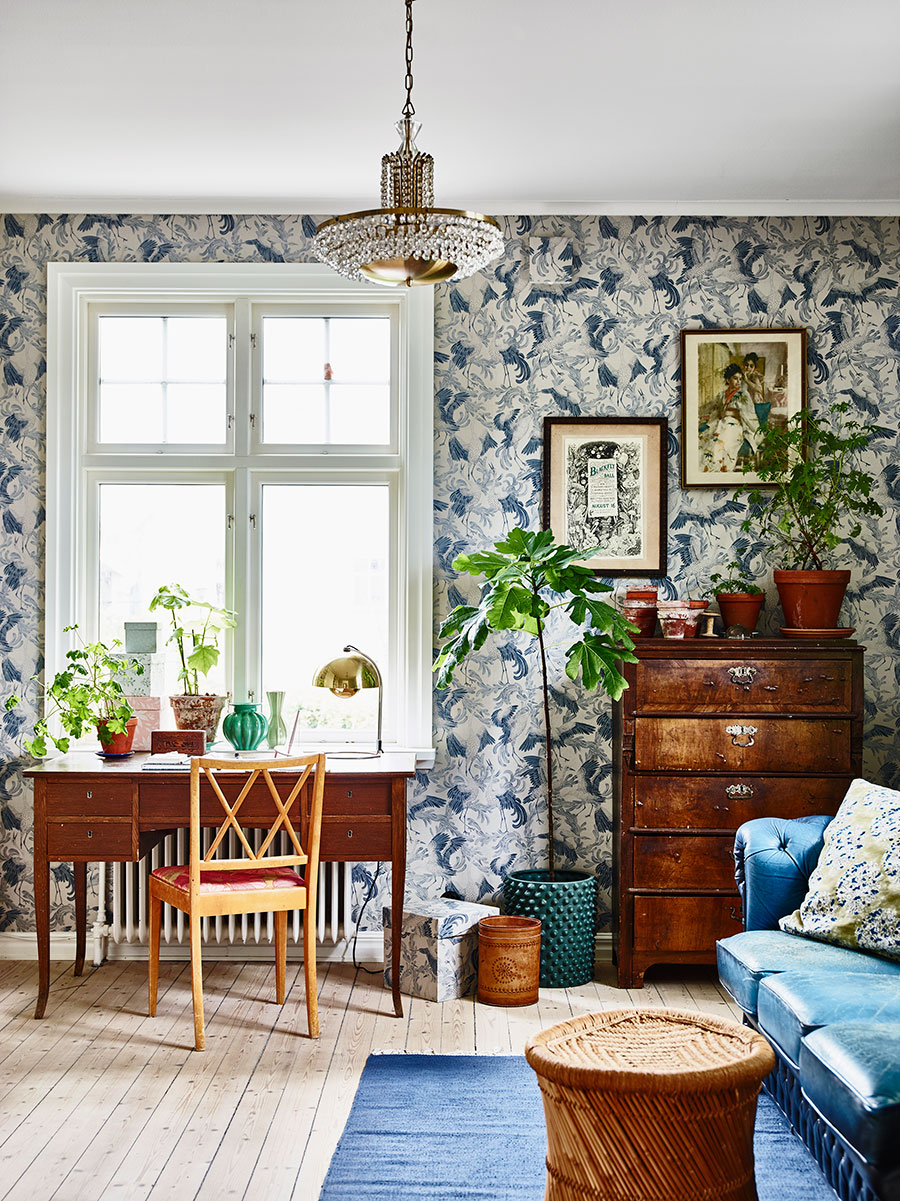 Kristin Lagerqvist's blue and white wallpapered living room with wood antiques | Swedish house tour via coco kelley