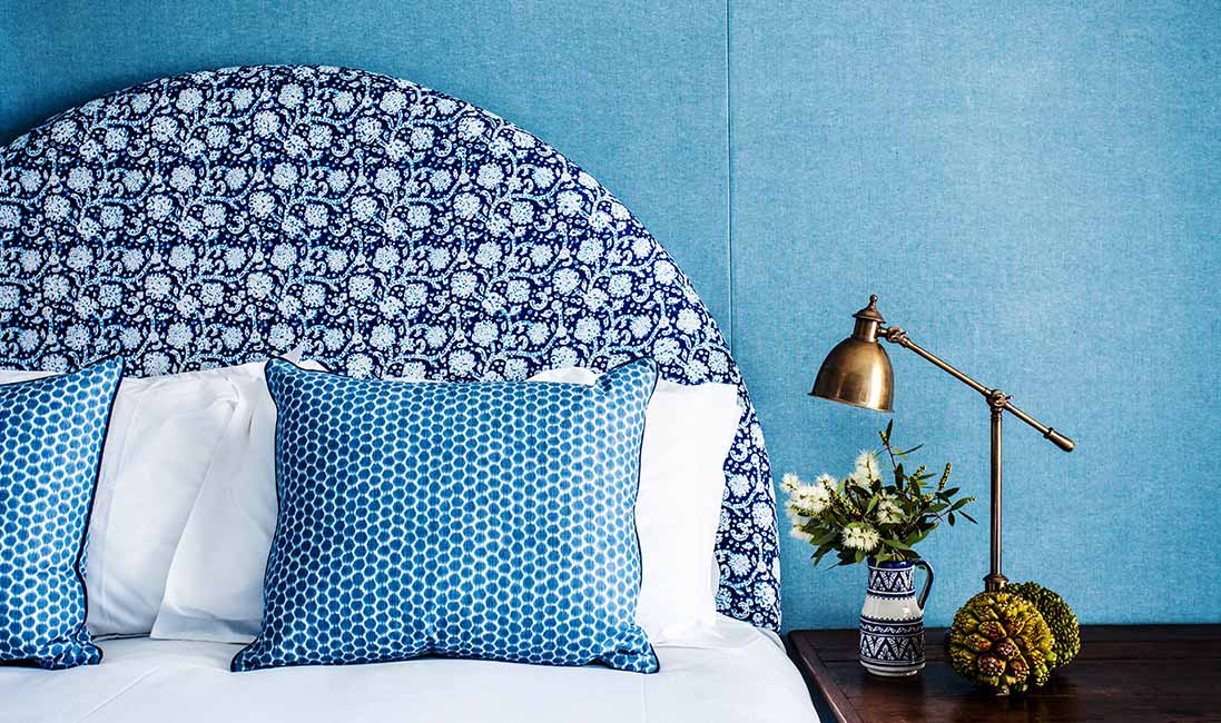 layered blue on blue textiles at Halcyon House | coco kelley