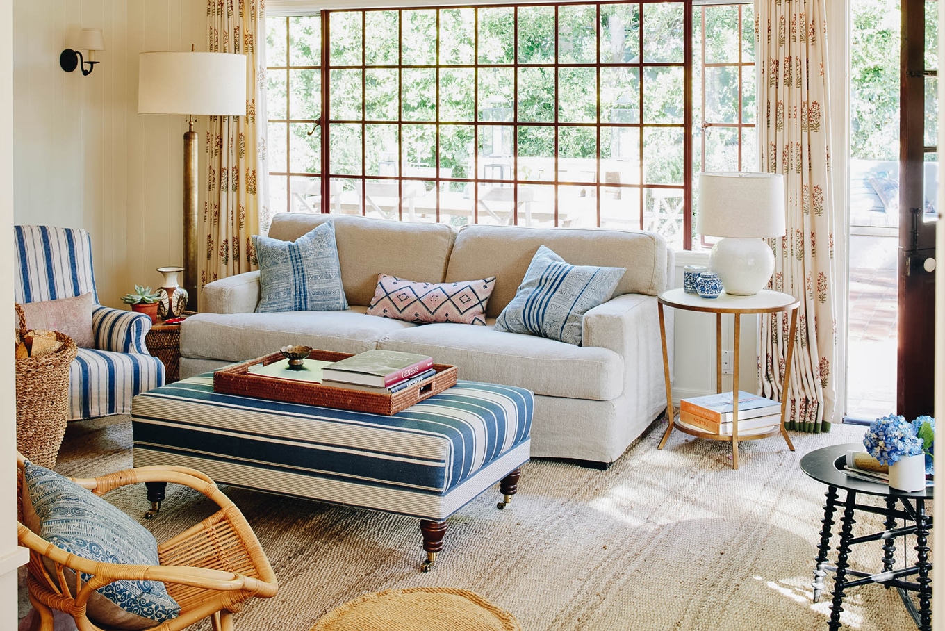 layered textiles and stripes in a casual sitting area | california hacienda house tour on coco kelley