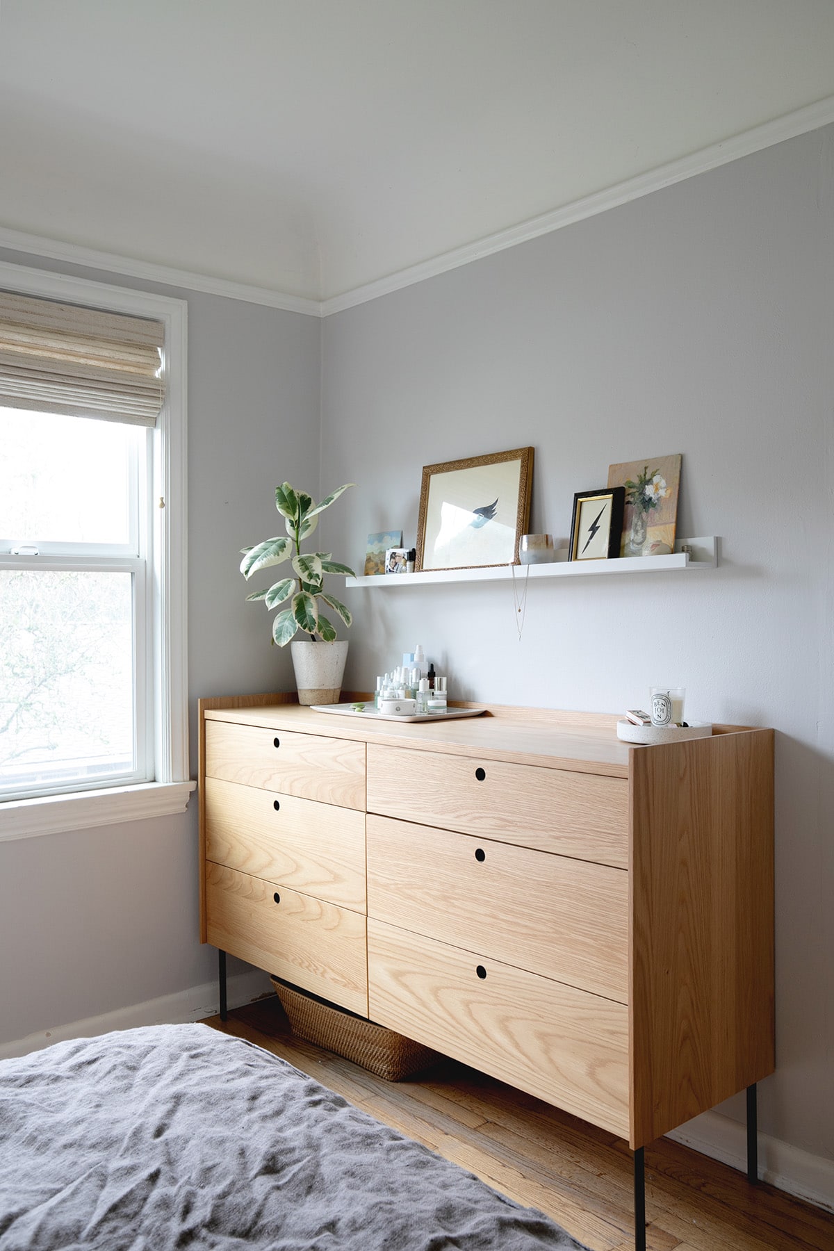 lilac walls and warm wood balance eachother in this tiny master bedroom makeover