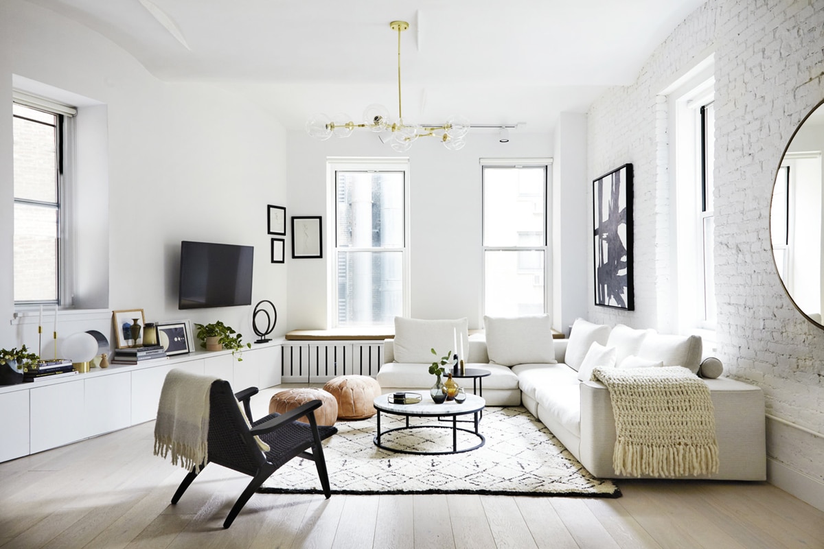 living room with low seating and minimal furnishings by tali roth designs