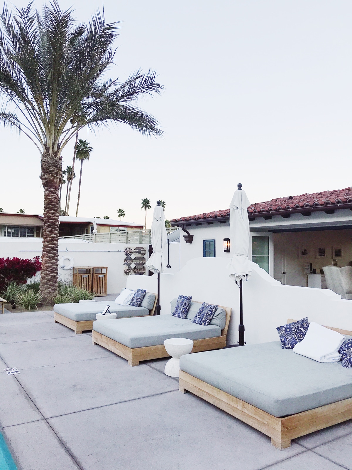 lounge area by the pool | tour of la serena villas palm springs on coco kelley