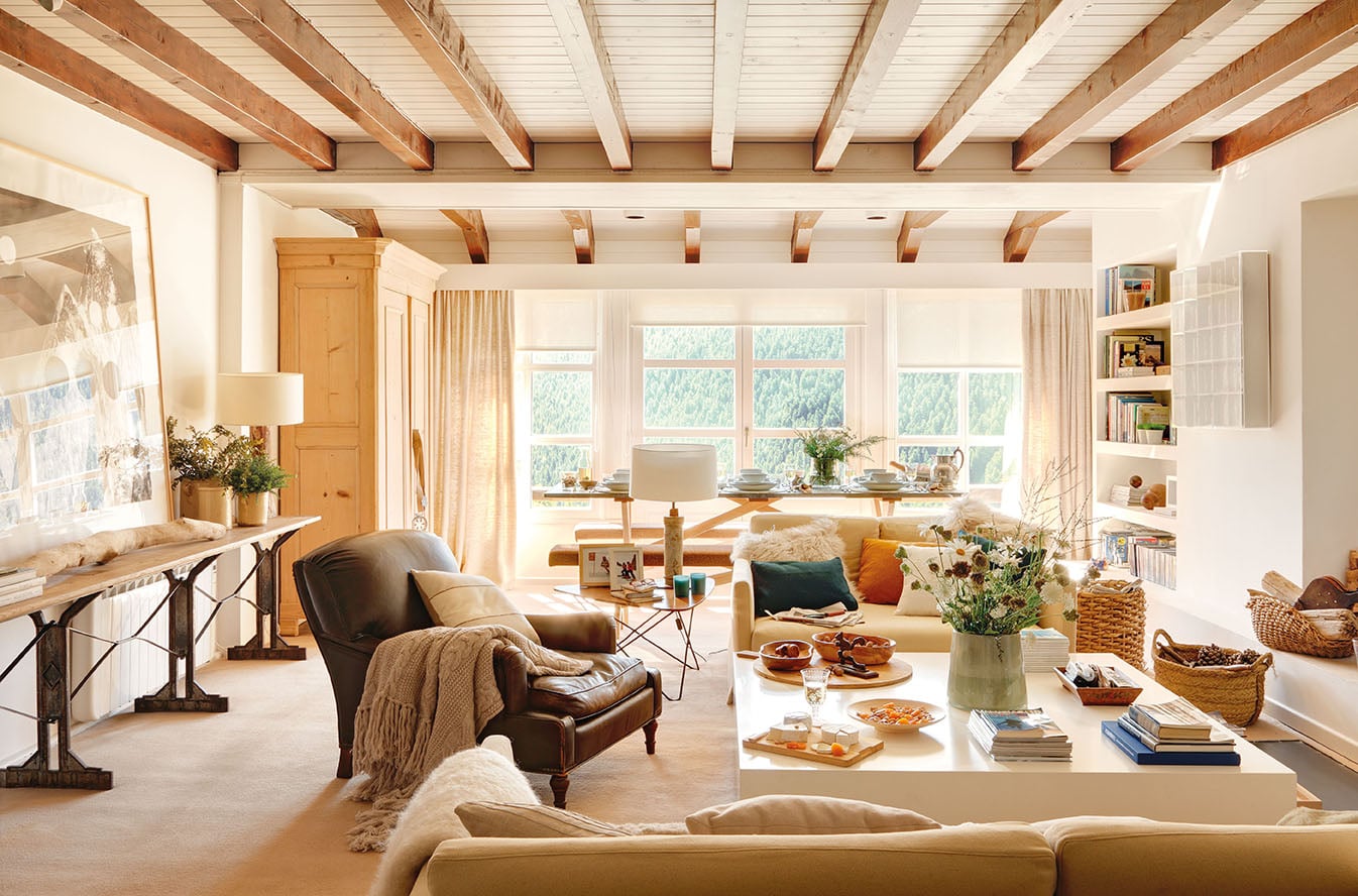 love this open living and dining room with warm tones and exposed beams | coco kelley room of the week