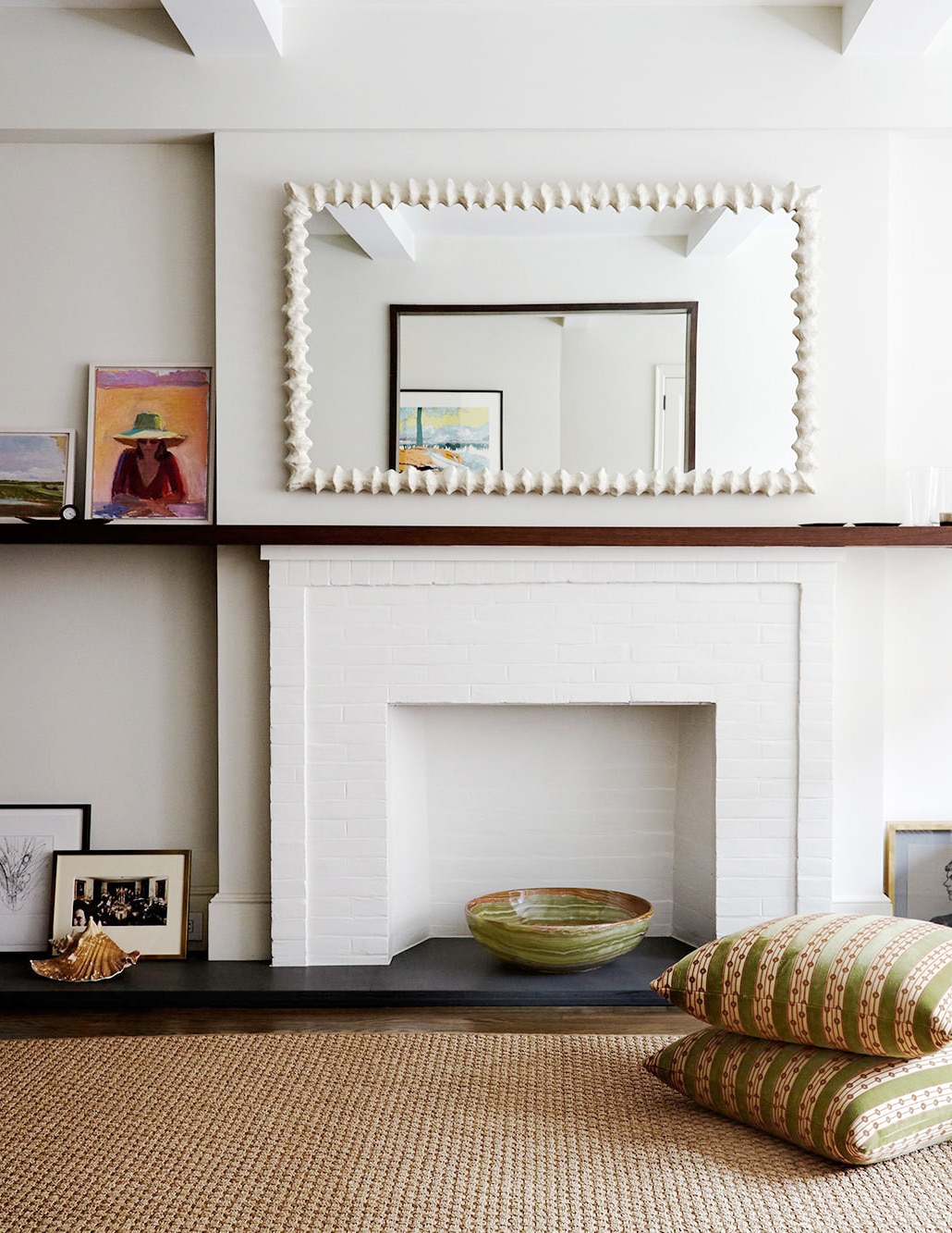 extended mantel and art with mirror | room of the week via coco kelley