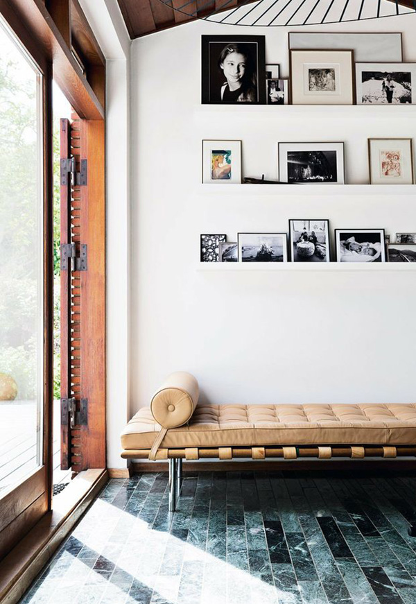marble floors, gallery wall, leather bench in bolig magazine // via coco kelley