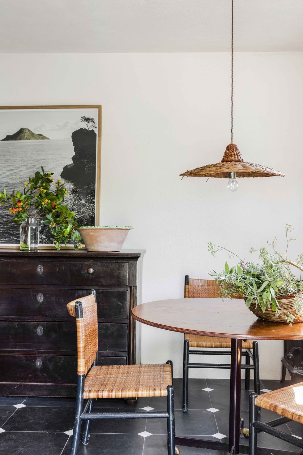 mix of antiques in a small italian vacation home dining room