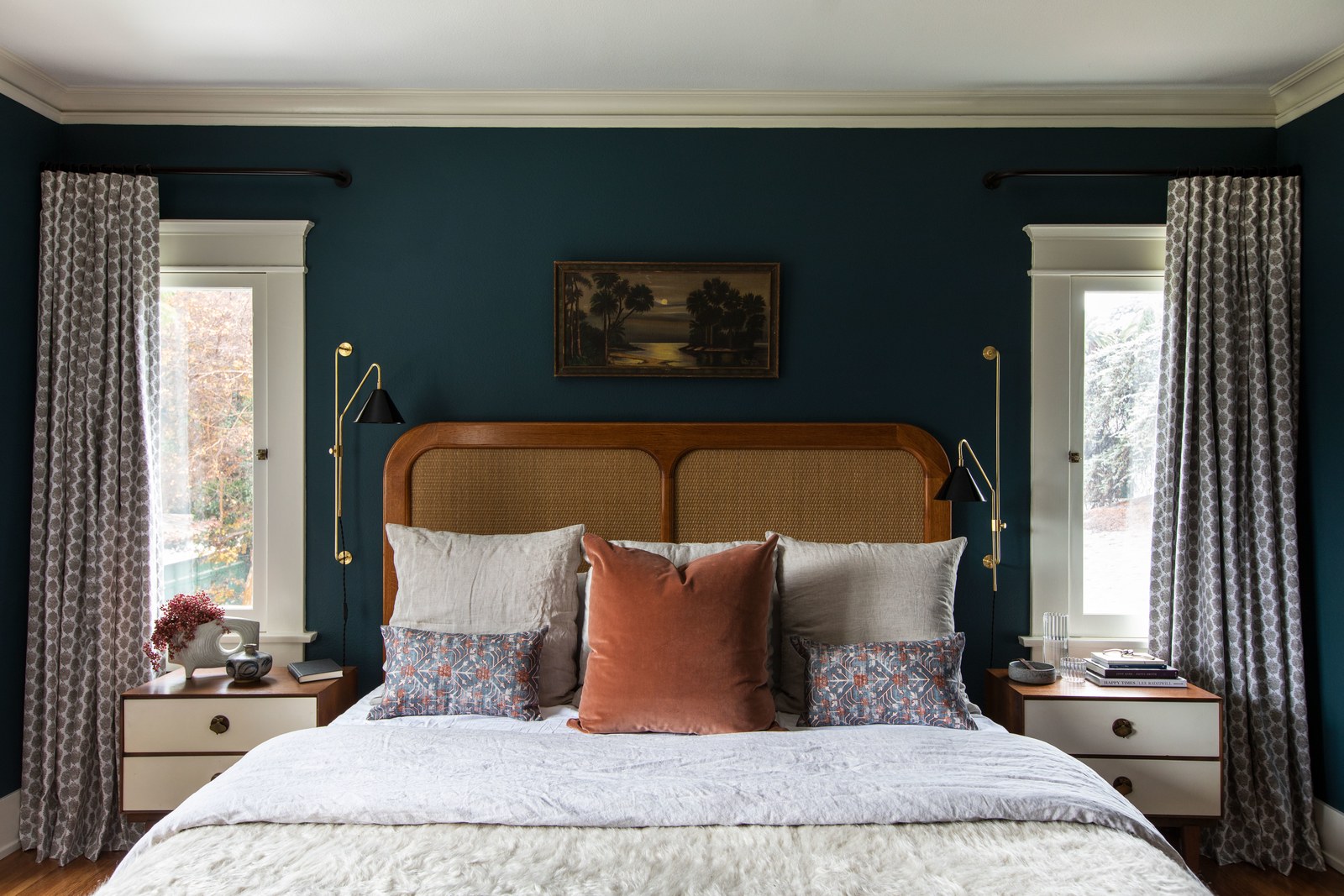 midcentury bed and dark blue teal paint in the bedroom | modern historic craftsman house tour jacey duprie