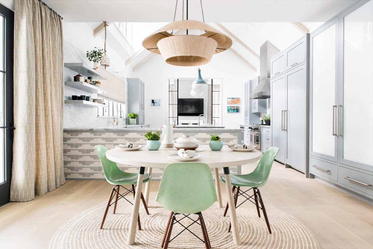 mint green chairs and a woven pendant in the casual breakfast nook | fresh pattern and color house tour on coco kelley