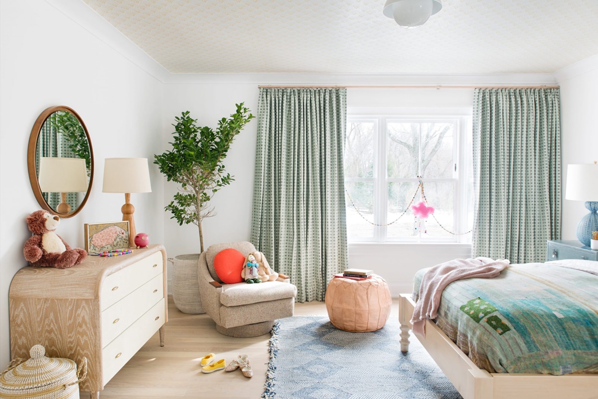 mod dresser and muted greens in this bedroom by cortney bishop design | house tour on coco kelley