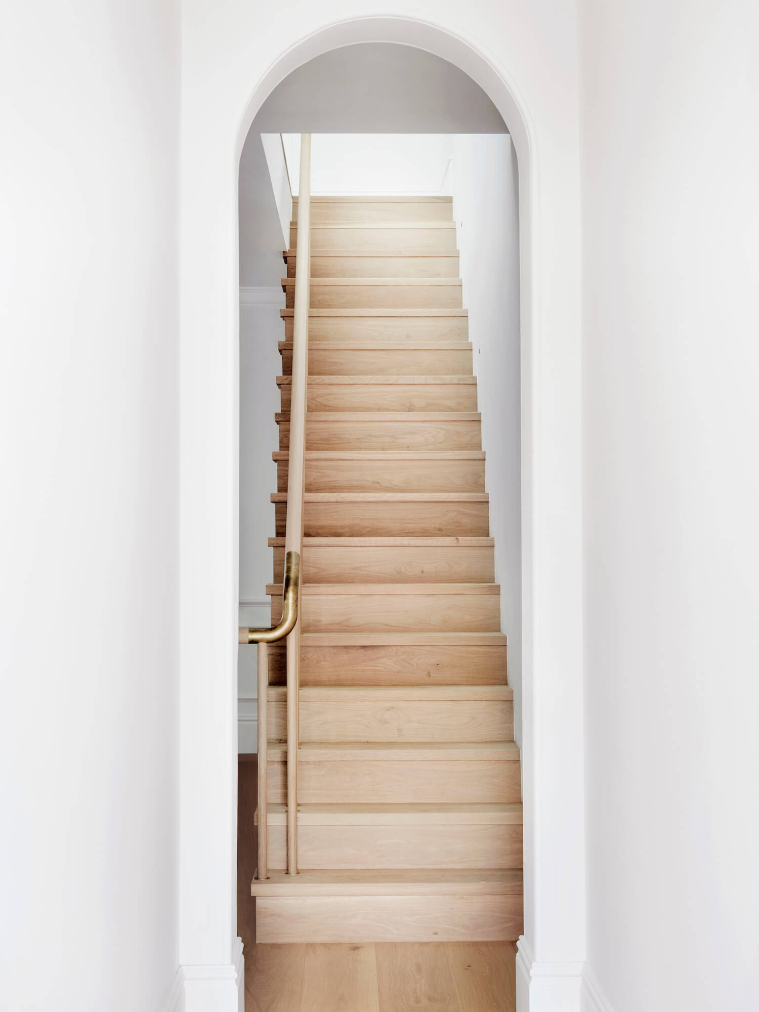 modern white oak staircase with brass detail | house tour on coco kelley