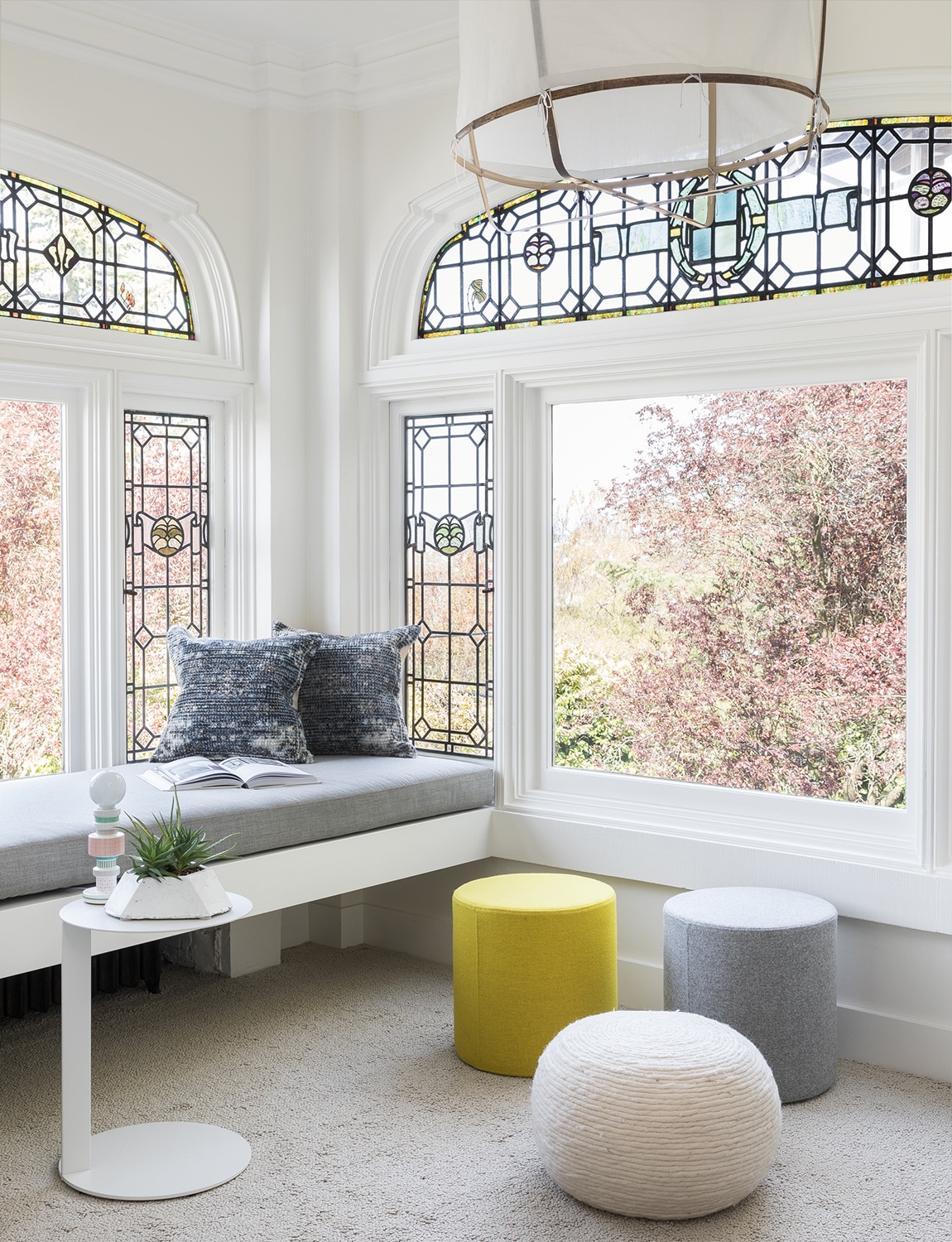 modern window seat with stained glass windows NB design group