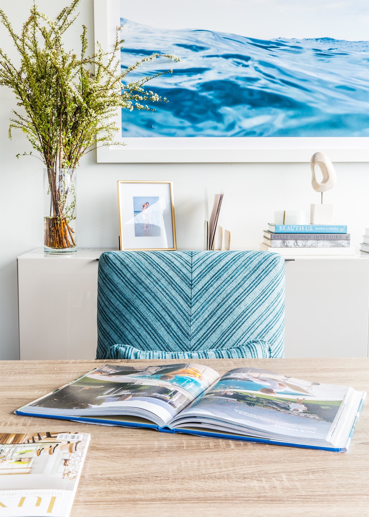neutral office with a bit of beach blue - corporate office makeover | emerald studio interior design on coco kelley