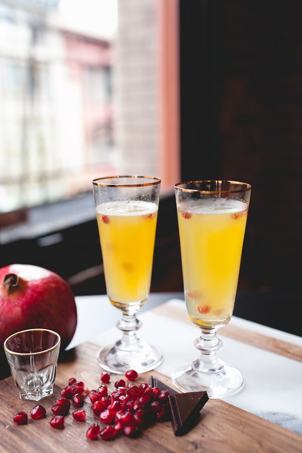orange pomegranate mimosas with chocolate bitters | coco+kelley