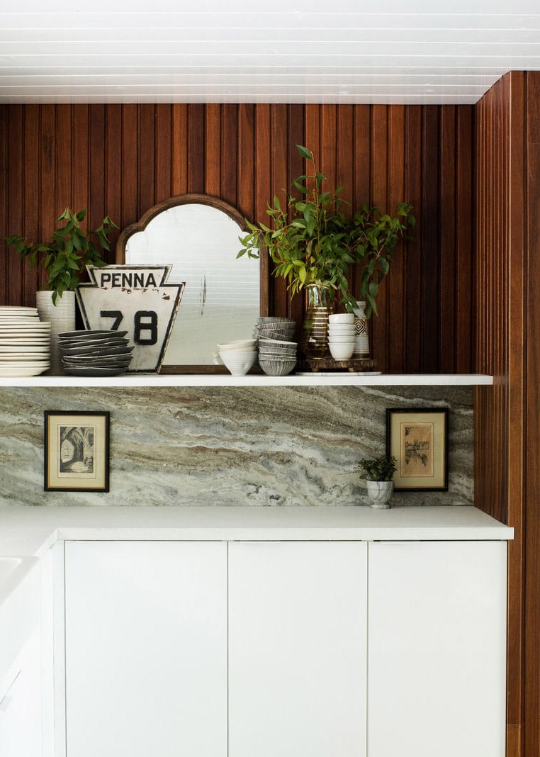 paneled wood wall kitchen in this mid-century modern house tour | coco kelley