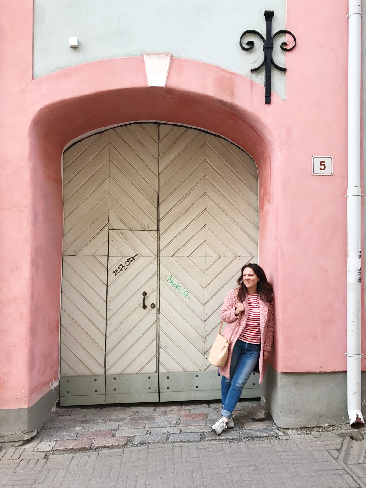 see the pastel walls and beautiful doors of Tallinn, Estonia | visual travel diary on coco kelley