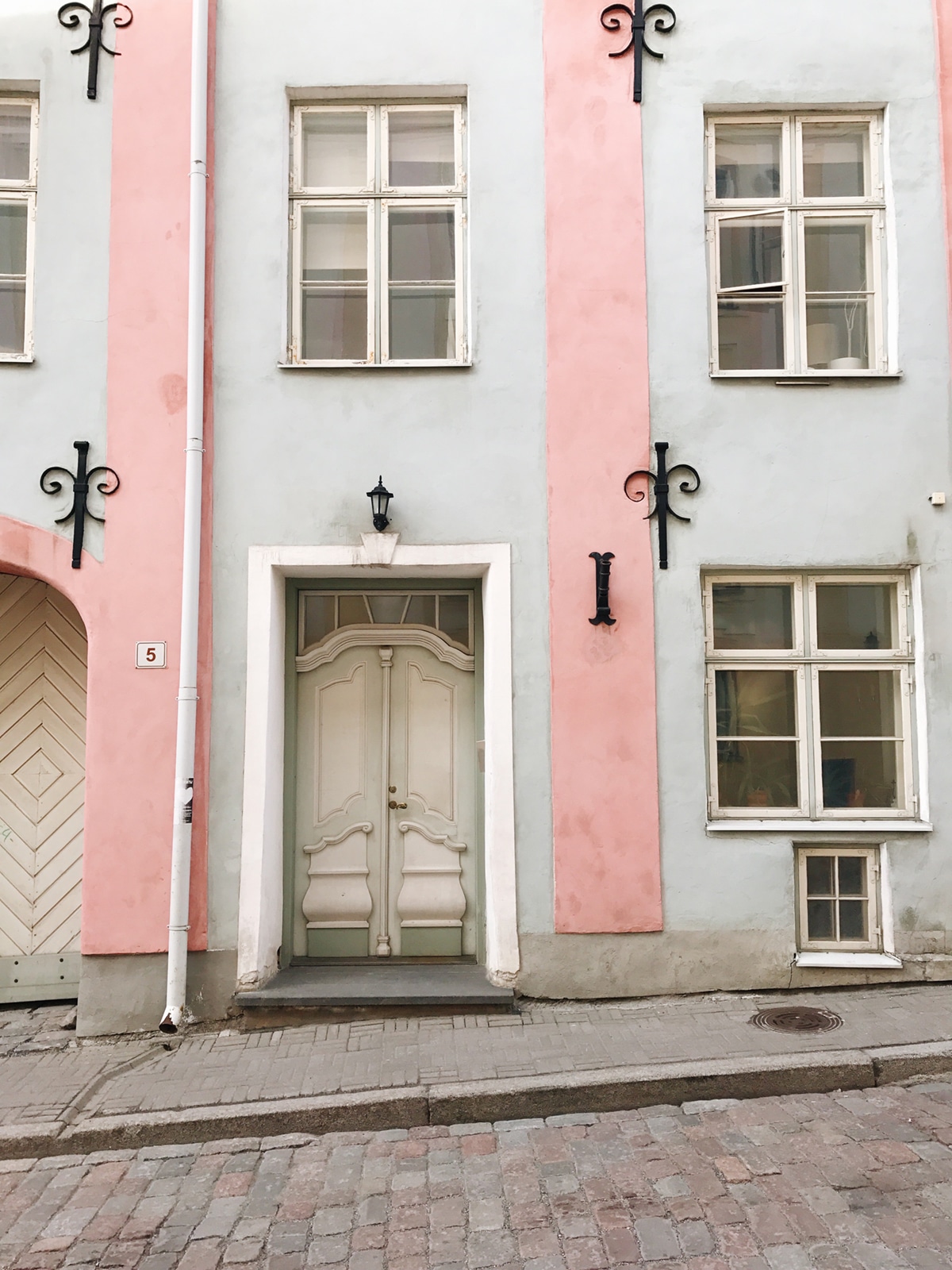 see the pastel walls and beautiful doors of Tallinn, Estonia | visual travel diary on coco kelley
