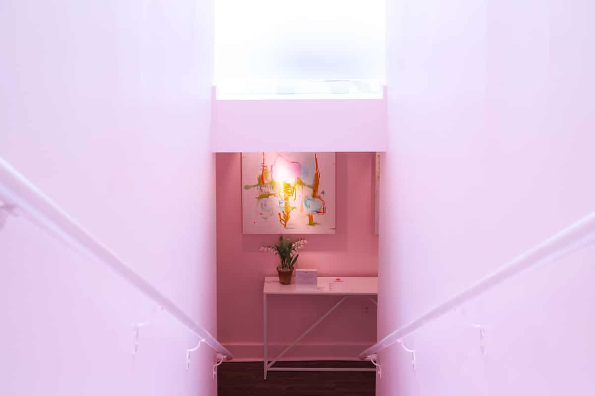 pink stairwell leads to the Quirk Gallery | quirk hotel richmond design tour on coco kelley