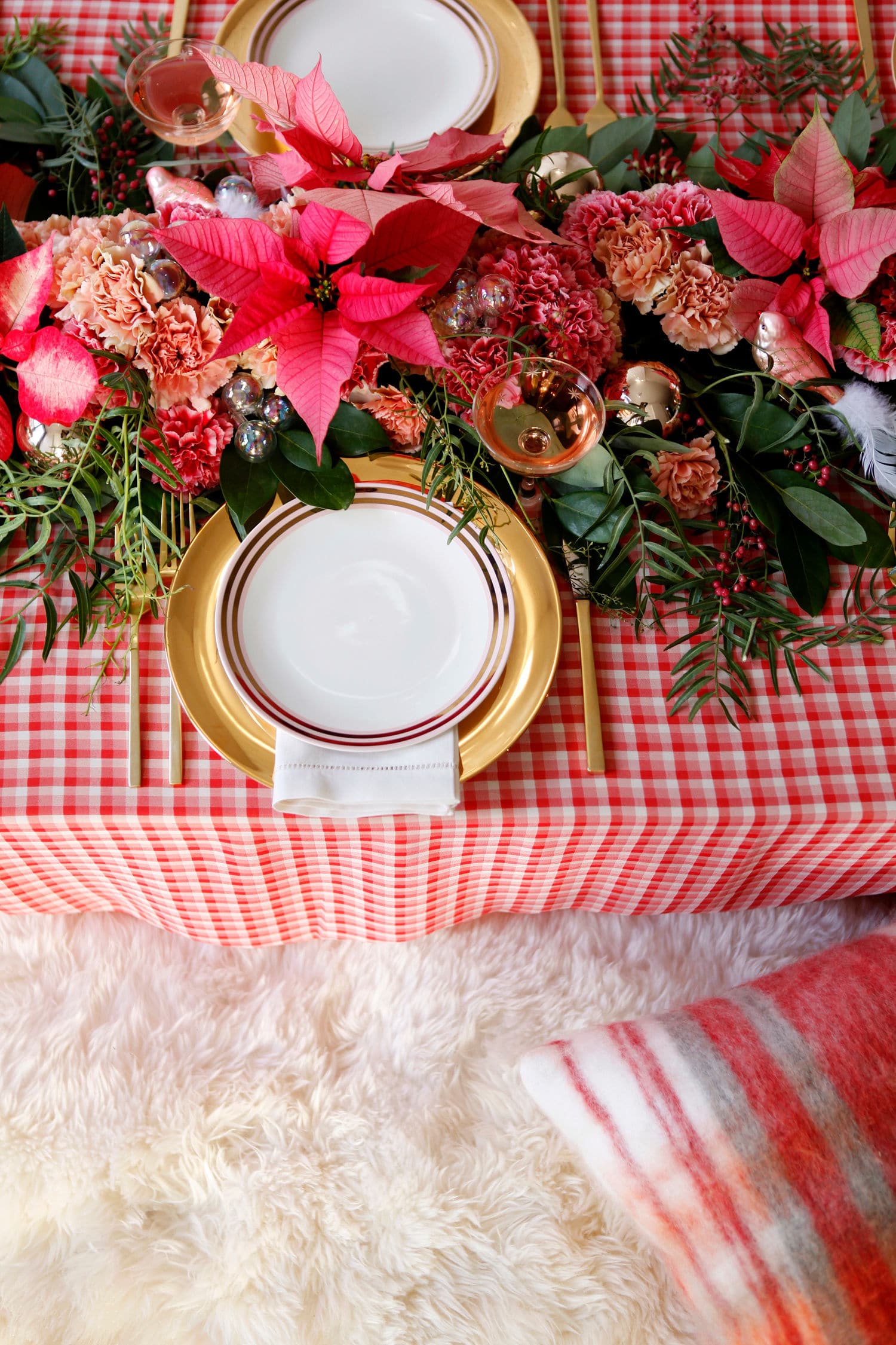 plaid and poinsettia christmas tabletop with floral runner by coco kelley