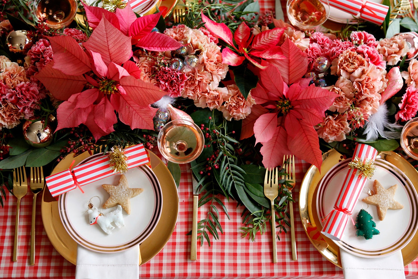 pink and red plaid and poinsettia christmas tabletop with floral runner by coco kelley