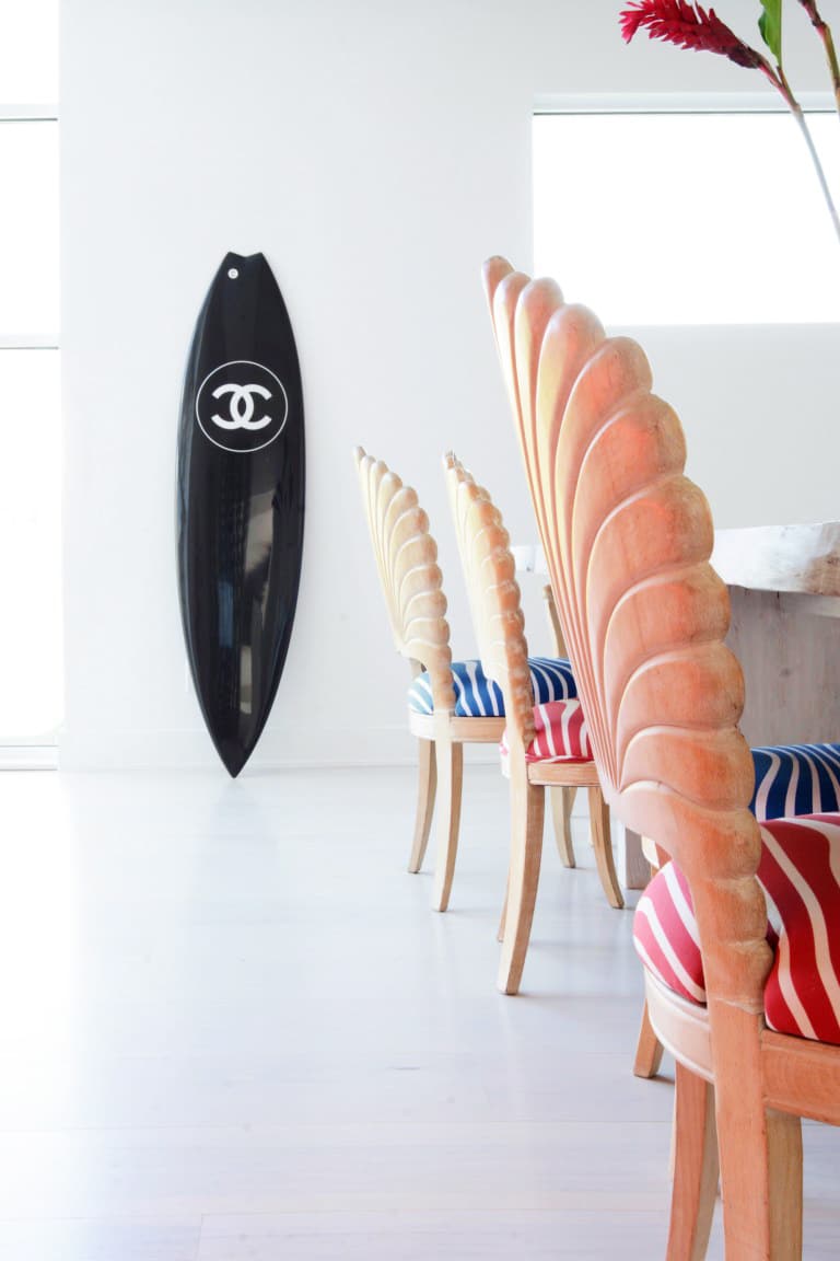 seashell chaisr and a chanel surfboard | via coco kelley