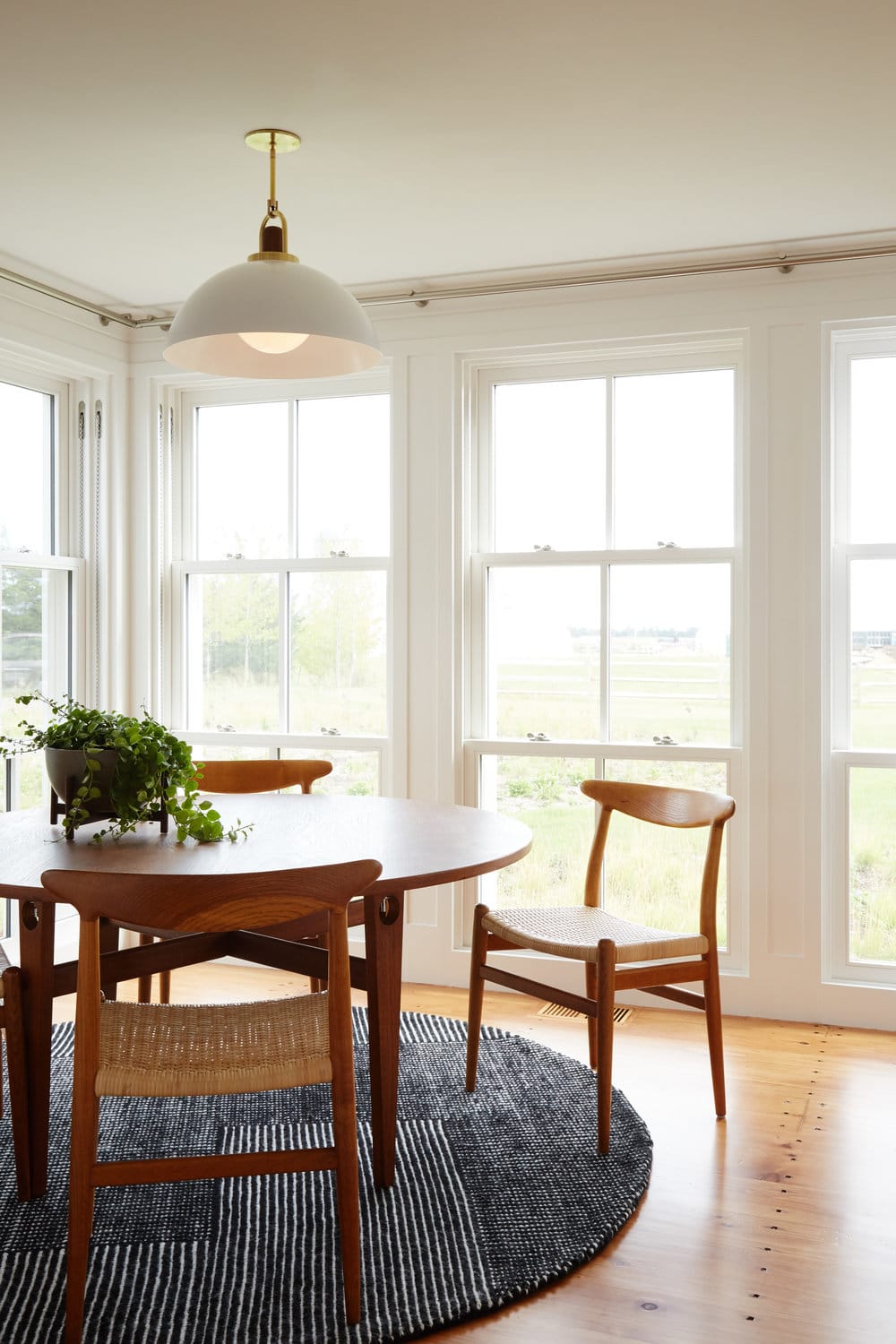 simple casual breakfast nook with mid-century style | modern shaker beach house tour on coco kelley