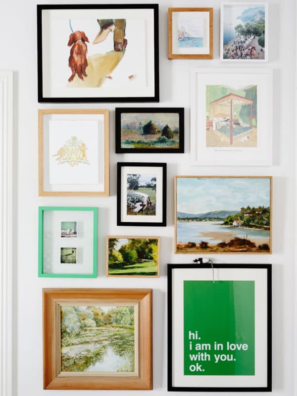 small art wall with green accents | design files via coco kelley