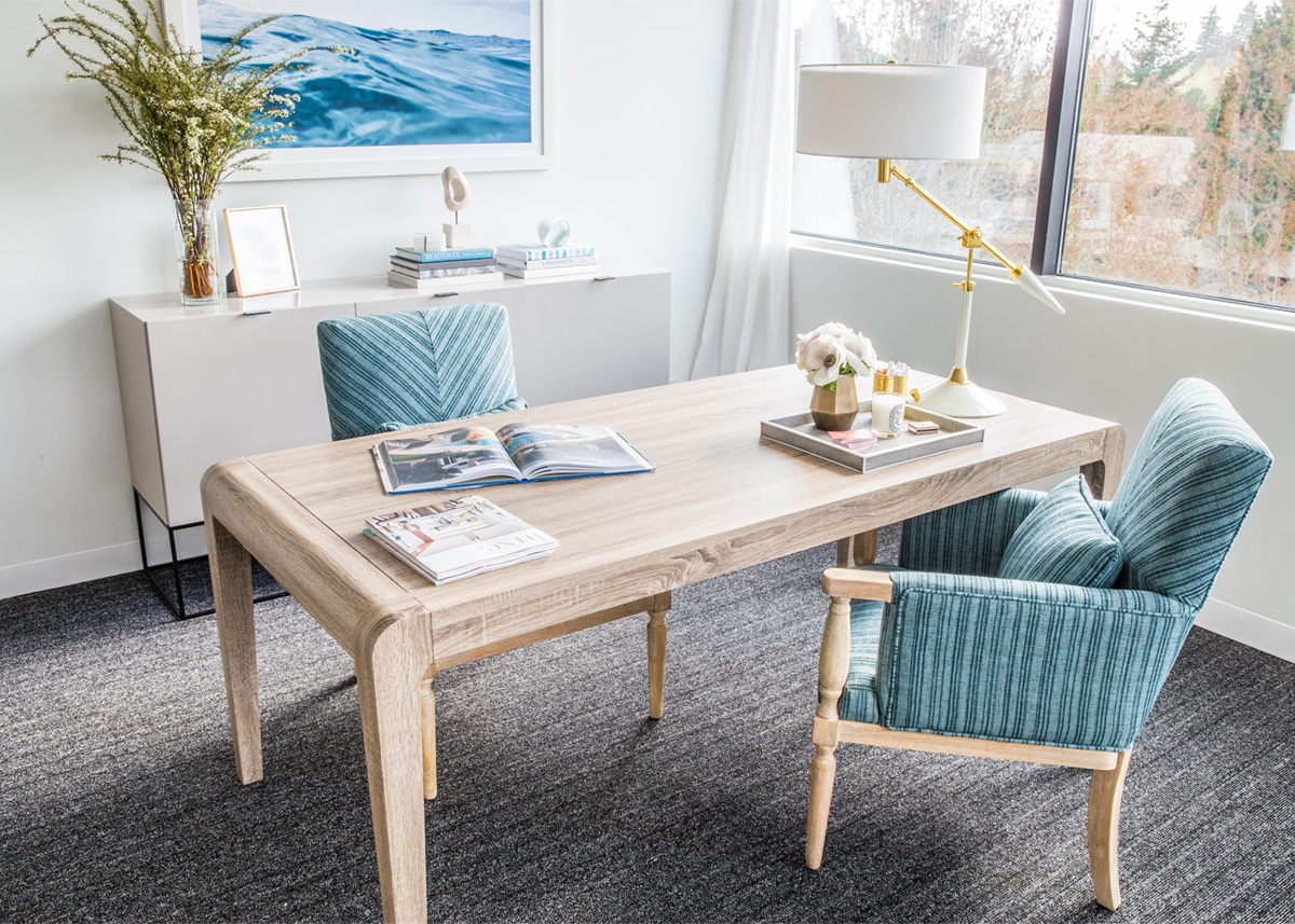 soft neutral desk area with pretty blue accents | corporate office makeover by emerald studio interior design on coco kelley