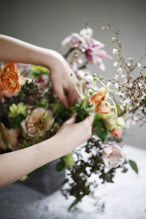 spring floral arrangement tutorial from cozbi jean and coco kelley - final touch - rununculus!