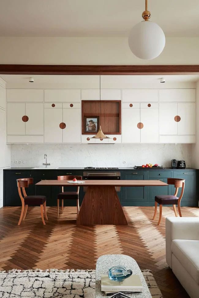 stunning mid-century inspired open kitchen with herringbone floors and circle details | polish prewar apartment tour on coco kelley