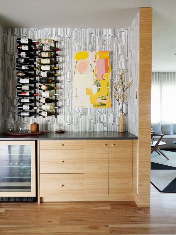 sunset idea house tour - wine bar with black and white wallpaper | via coco+kelley