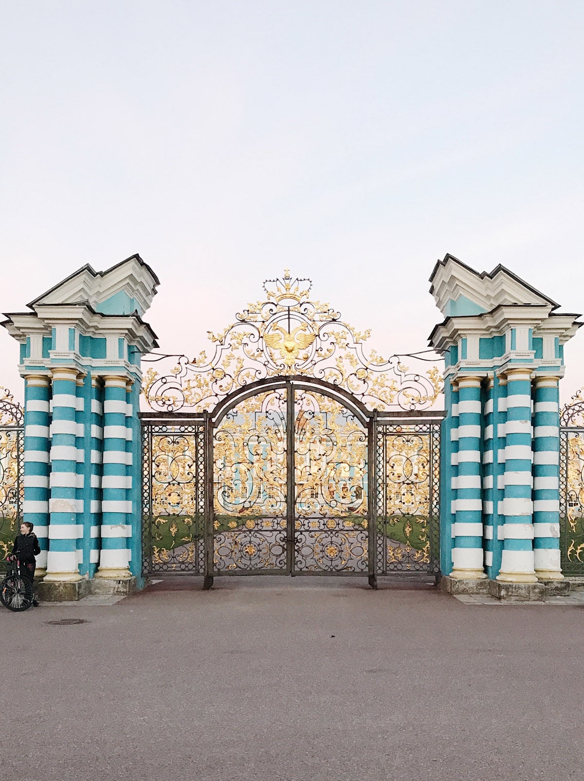 the blue and white striped gates to Catherine's Palace | St Petersburg travel diary on coco kelley