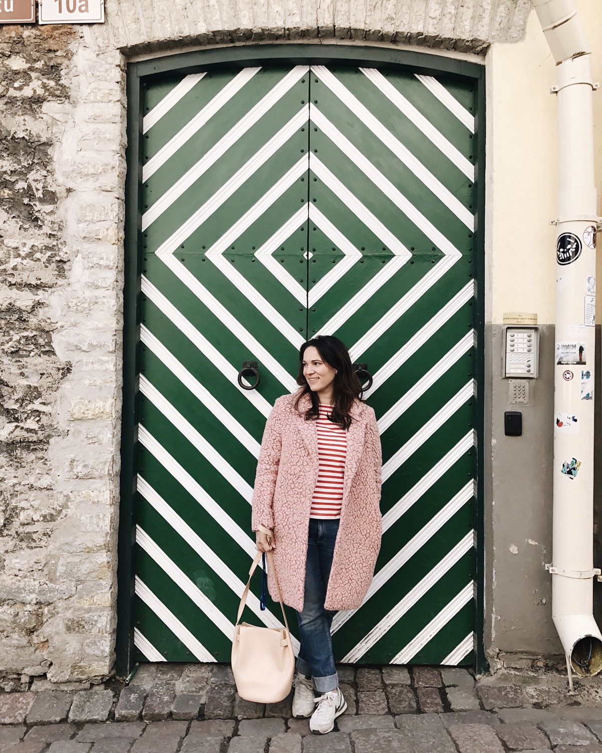 see the pastel walls and beautiful doors of Tallin, Estonia | visual travel diary on coco kelley