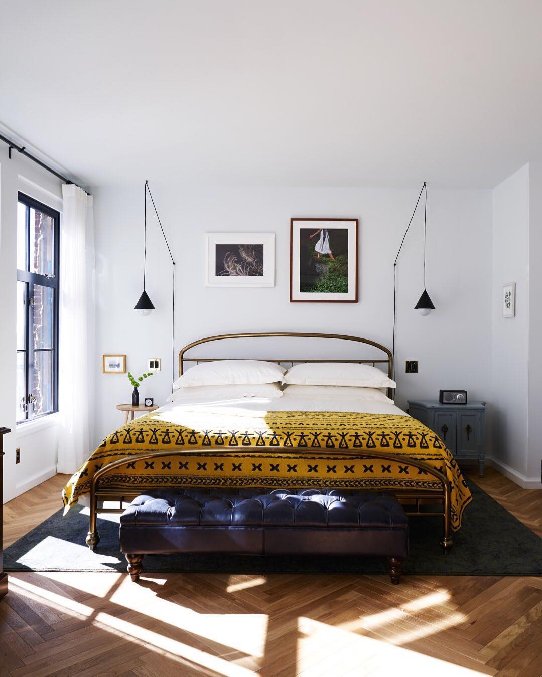 the line hotel modern bedroom with yellow throw
