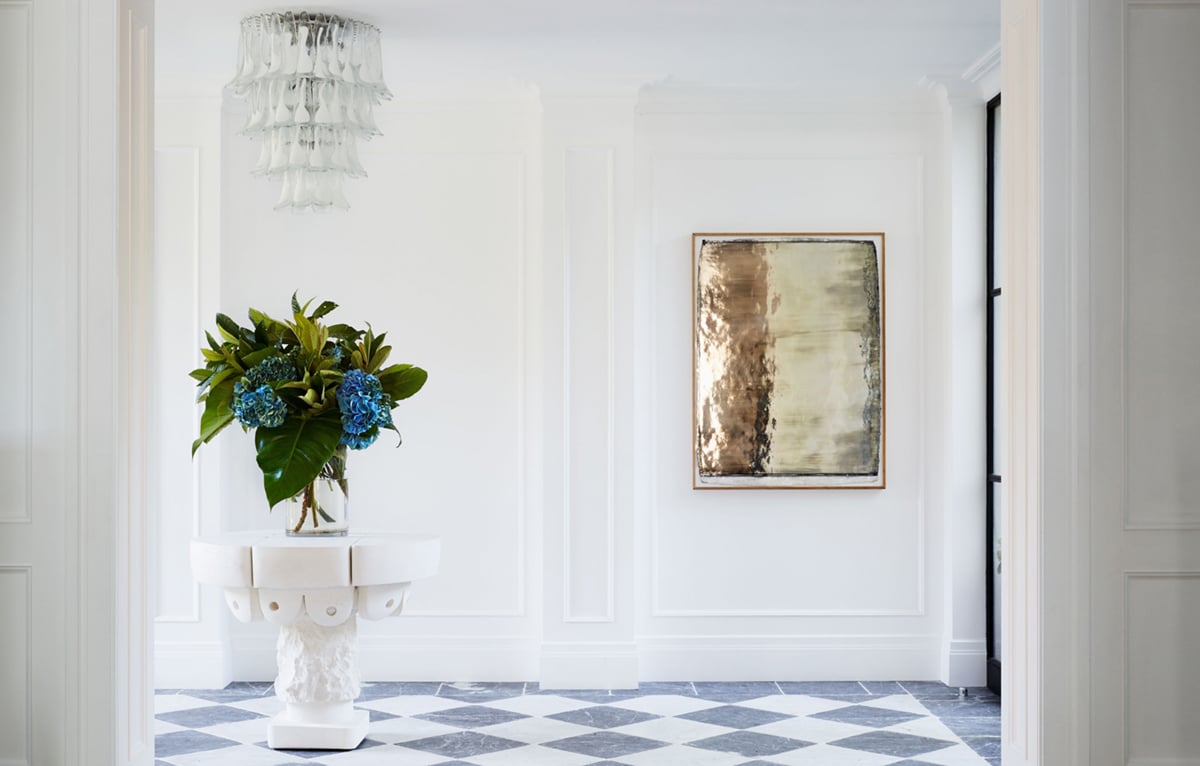 the most stunning entryway with checkered tile floor and sculptural table | melissa marshall home tour on coco kelley