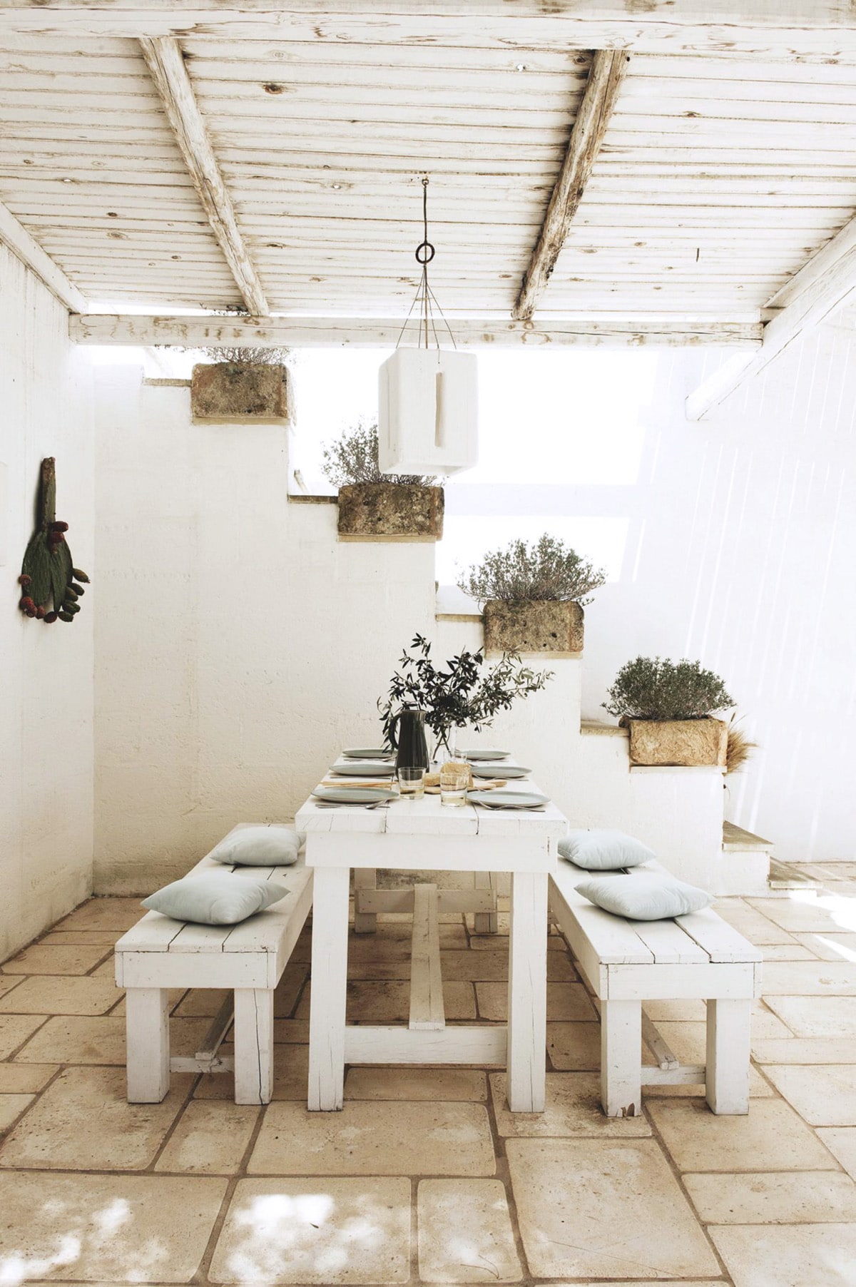 outdoor dining in the shade in puglia vacation home | coco kelley