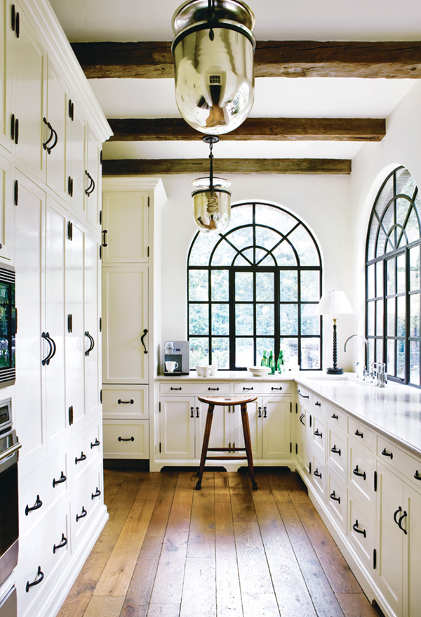 white kitchen with oil-rubbed bronze hardware // litchfield designs via coco kelley