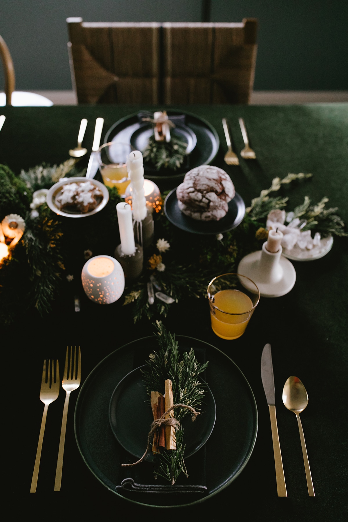 winter solstice tabletop with pine smudge sticks at each place setting | coco kelley