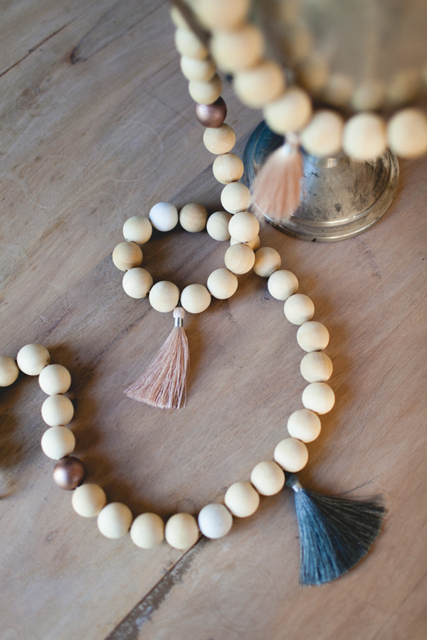 wood bead and tassel garland DIY | via coco+kelley