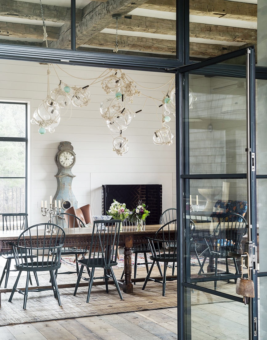wood beams, shiplap walls and shaker chairs in this farmhouse dining room | see the full house tour on coco kelley